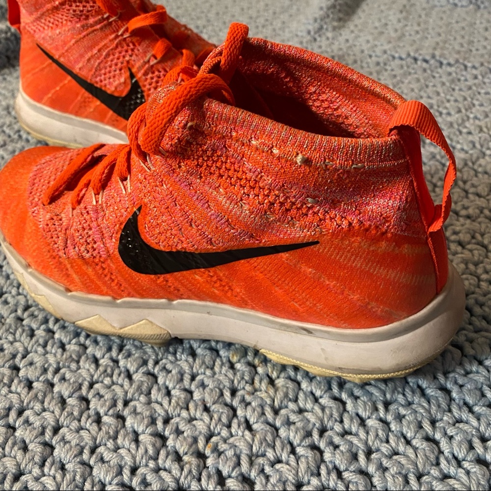 Nike orange high top shoes size 6